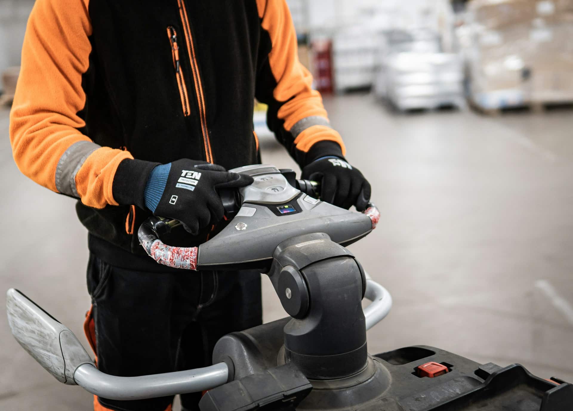 forklift operator maneuvering through a warehouse
